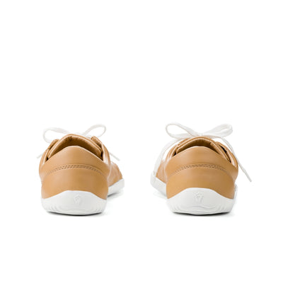 Beige colored vegan sneakers shown from a back heel view on a white background. #color_beige