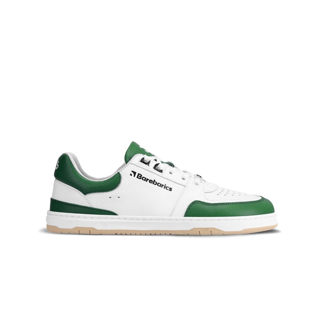 A photo of a green and white classic sneaker with a perforated toe box, the sole is white with tan thread, barebarics brand name is written on the side. The right sneaker is shown from the right side against a white background. #color_white-dark-green