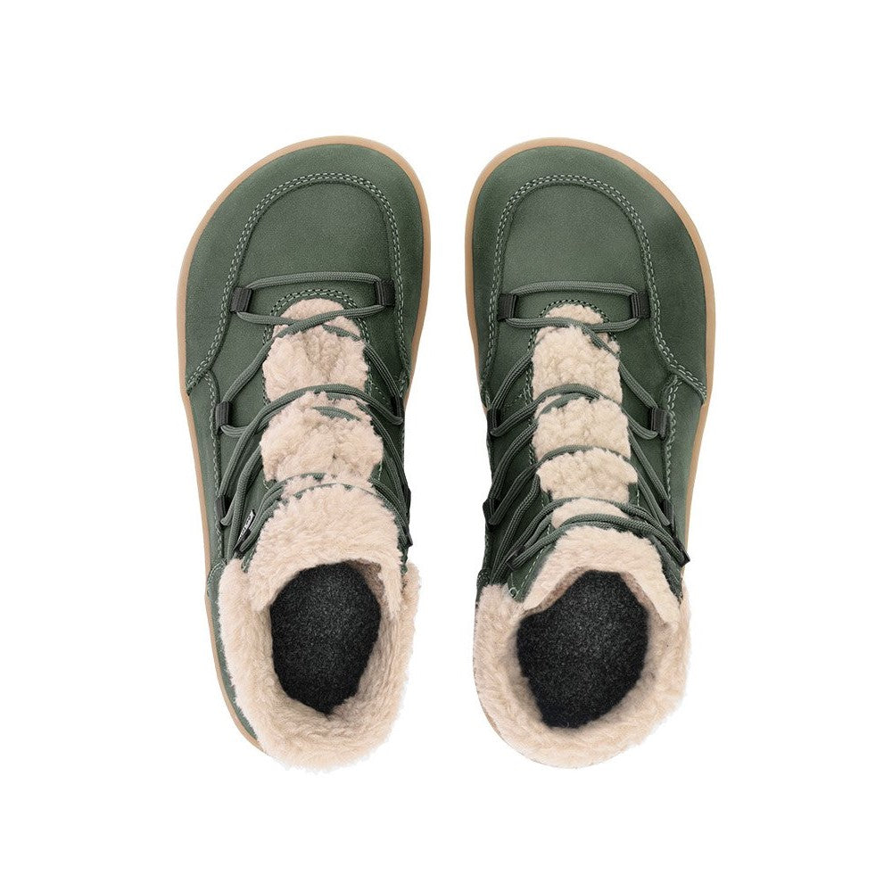 Photo 1 - A photo of Belenka Bliss Boots made from pine green nubuck leather and tan rubber soles. The boots have an off-white fleece lining around the whole tongue and top of the ankle opening. The laces are wide across the boot top and have speed hooks at the at the top. Right boot is shown from the right side against a white background. Photo 2 - Both shoes are shown from the top down against a white background. #color_pine-green