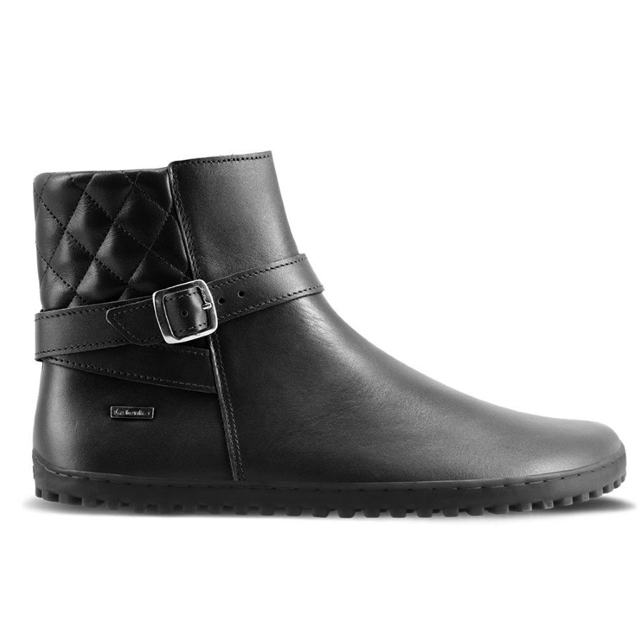 A photo of Be Lenka Diva boots in all black. Boots are made from smooth black leather. A quilted leather design is present in the back, a silver buckle on the side, a strap around the ankle, and a zipper. Right shoe is shown from the right side against a white background. #color_all-black