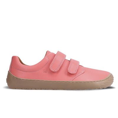Photo 1 - A photo of Be Lenka Bounce kids play sneaker in coral pink smooth leather with tan soles. Shoes are simple in design with two velcro closures. Right shoe is shown from the right side against a white background. Photo 2 - Both shoes are shown from the top down against a white background. #color_coral-pink