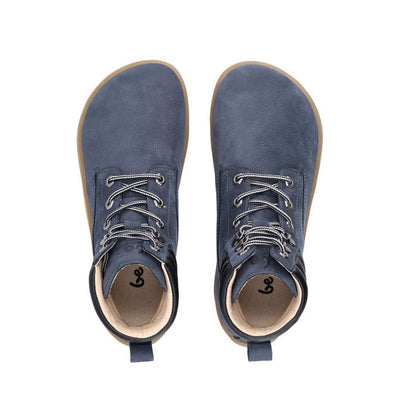 Photo 1 - A photo of Be Lenka Nevada Boots made from dark blue leather and tan rubber soles. The boots are a lace-up combat boot style with a black padded collar and silver chunky eyelets. Right boot is shown from the right side against a white background. Photo 2 - Both shoes are shown from the top down against a white background. #color_dark-blue
