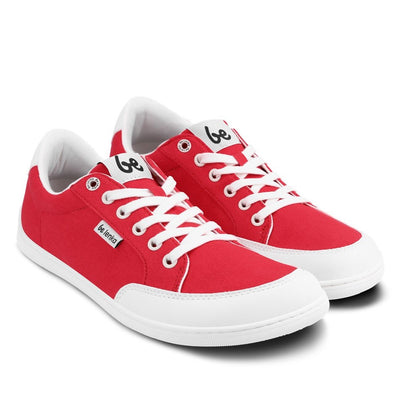 Red Be Lenka Rebound sneakers with white laces, microfiber toe guards, heel accents, and rubber soles. Both shoes are facing diagonally right against a white background. #color_red-white