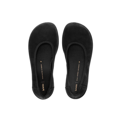 A photo of the Be Lenka Sophie flats made from a leather upper and a microfiber interior. The flats are black in color with black rubber soles and are a simple ballerina flat design. Both shoes are shown together from above on a white background.  #color_matte-black