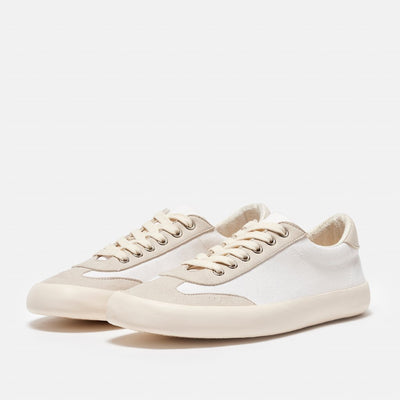 A photo of the Bohempia Felix vegan sneakers made from hemp canvas. The sneakers are white in color with a vegan suede tan toe cap and heel detail, with a tan sole and laces. Both shoes are shown together from the front left on a white background. #color_white-tan