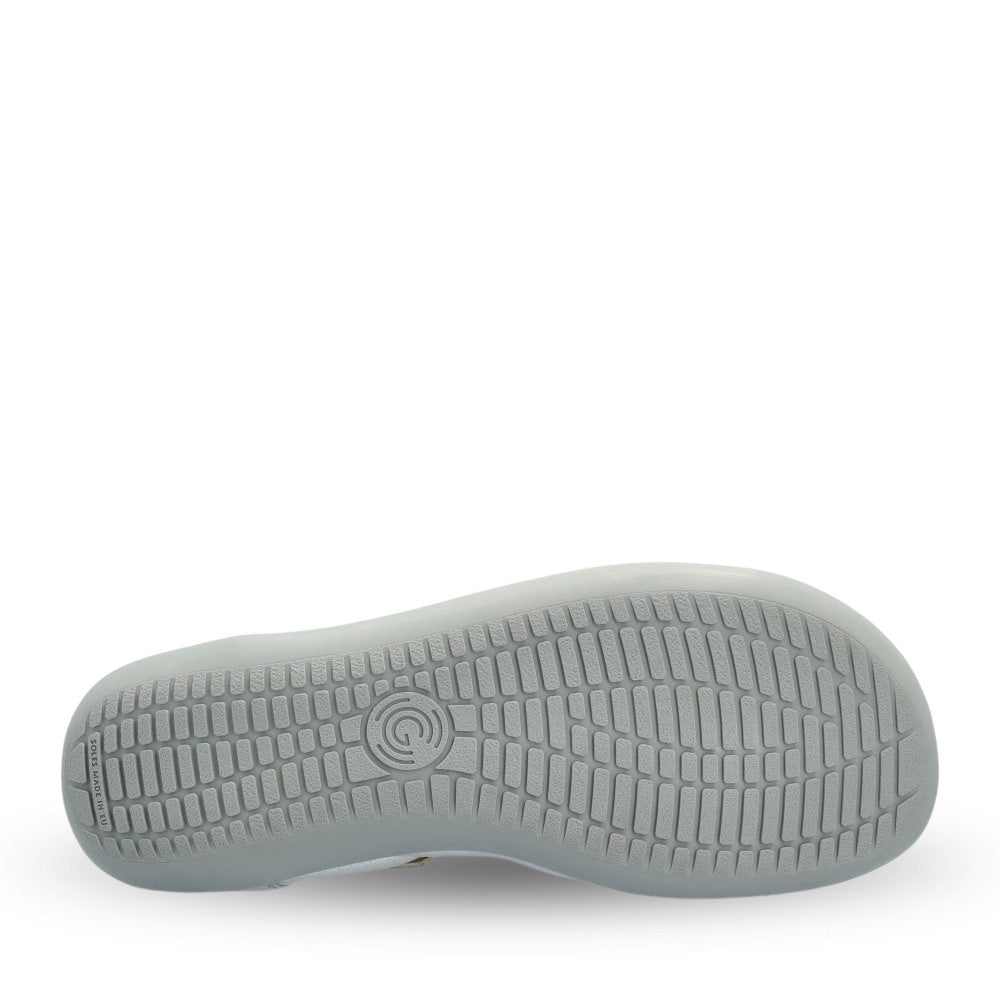 Silver Groundies Mary Jane with silver strap buckle and grey rubber soles. Right shoe sole is shown facing right against a white background. #color_silver