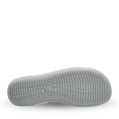 Silver Groundies Mary Jane with silver strap buckle and grey rubber soles. Right shoe sole is shown facing right against a white background. #color_silver
