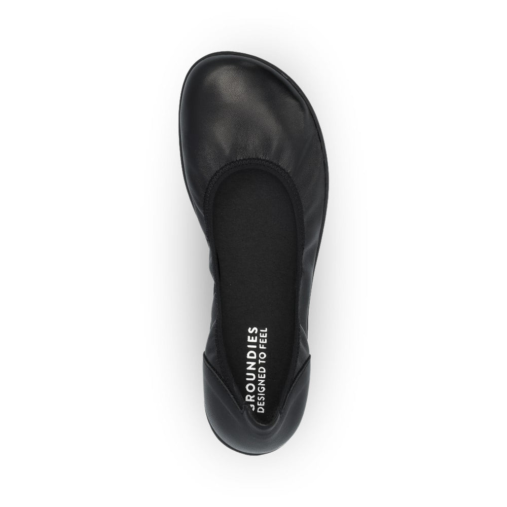 All black Groundies Lily 2 Classic ballet flats with an elastic opening. Right shoe is shown from above against a white background. #color_black