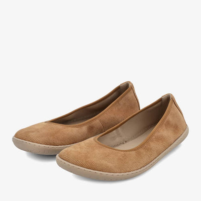 A photo of Groundies Lily Classic flats with a leather upper and tan rubber true sense soles. The flats are a perforated leather in a cognac color with trim around the tops. The interior of the flats is a light beige color. Both flats are shown beside each other facing to the left with the left flat on the outside against a white background. #color_cognac
