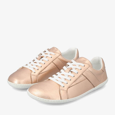 A photo of groundies melbourne shoes in metallic rose gold. Shoes are shown diagonally from the right side against a white background. #color_metallic-rose