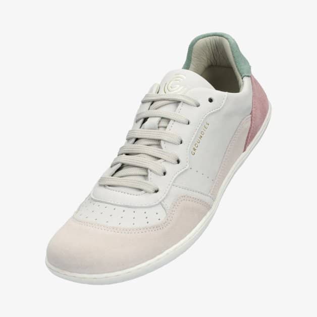 A photo of Groundies Nova GO1 Sneakers made with soft leather and white rubber soles. The sneakers have Beige, Green, and Pink color blocks. The left shoe is shown on the front left side against a white background. #color_beige-green-pink