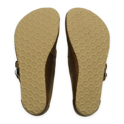 Brown nubuck leather Villet Mary Jane flats with double straps with silver buckle closures, tan leather lining, and tan rubber soles. Both shoe soles are shown from above against a white background. #color_brown-nubuck