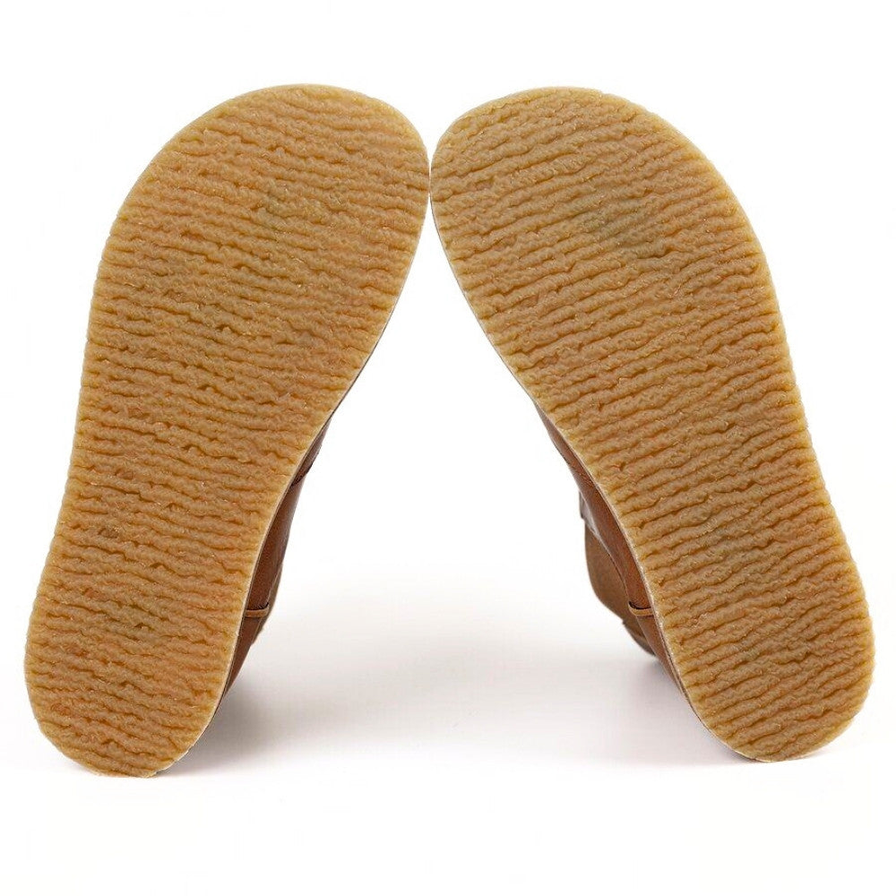 Brown leather Lang.S Luna Chelsea boots with a pull tab, tan interior leather, and tan rubber. Both boot soles are shown from below against a white background. #color_brown