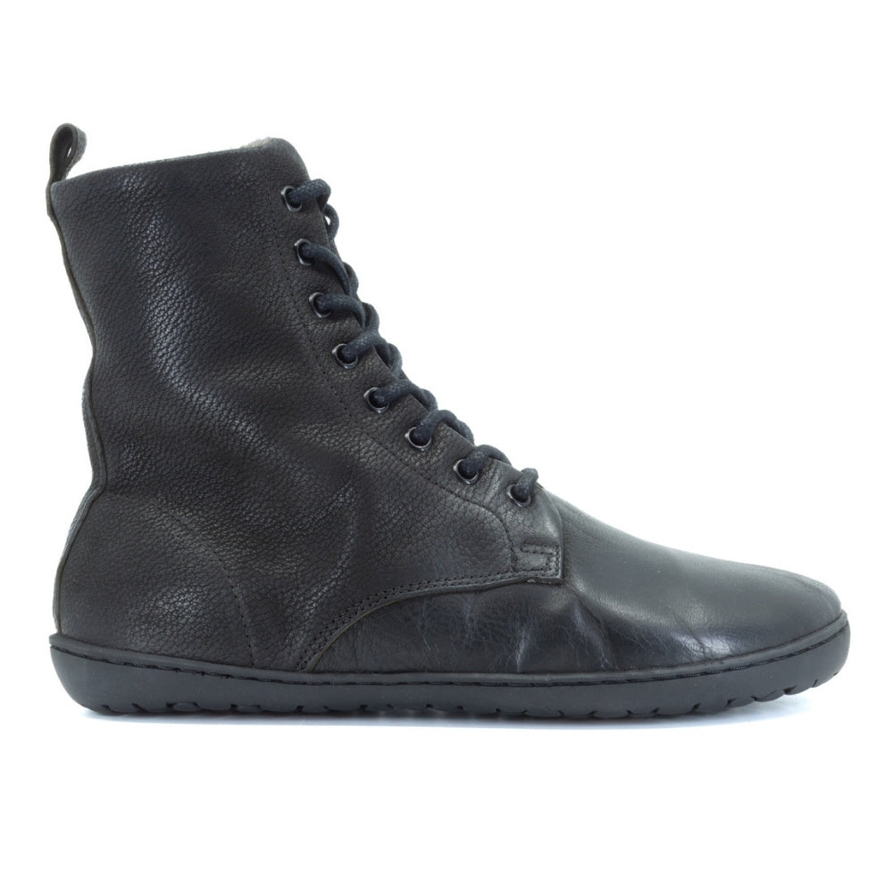 Black, leather, wool-lined Mukishoes Igneous combat-style, zip-up boots. Right shoe is shown facing right against a white background. #color_black