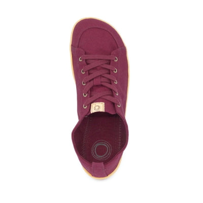 A photo of Mukishoes Roma fabric sneakers. Shoes are a deep wine color, simple in design, have a pull tab on the back, and a deep-wine colored lining, laces, and gum colored soles. Right shoe is shown here from above against a white background. #color_roma