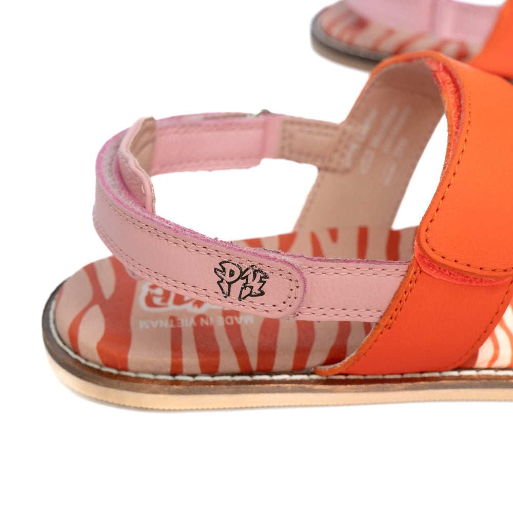 Orange and Pink So Wild PaperKrane leather sandals. Front strap over the ball of the foot and heel straps are pink and thinner strap over the arch is a reddish orange. Sole is an orange and red zebra print. Right shoe heel and arch strap are shown here against a white background. #color_orange-pink