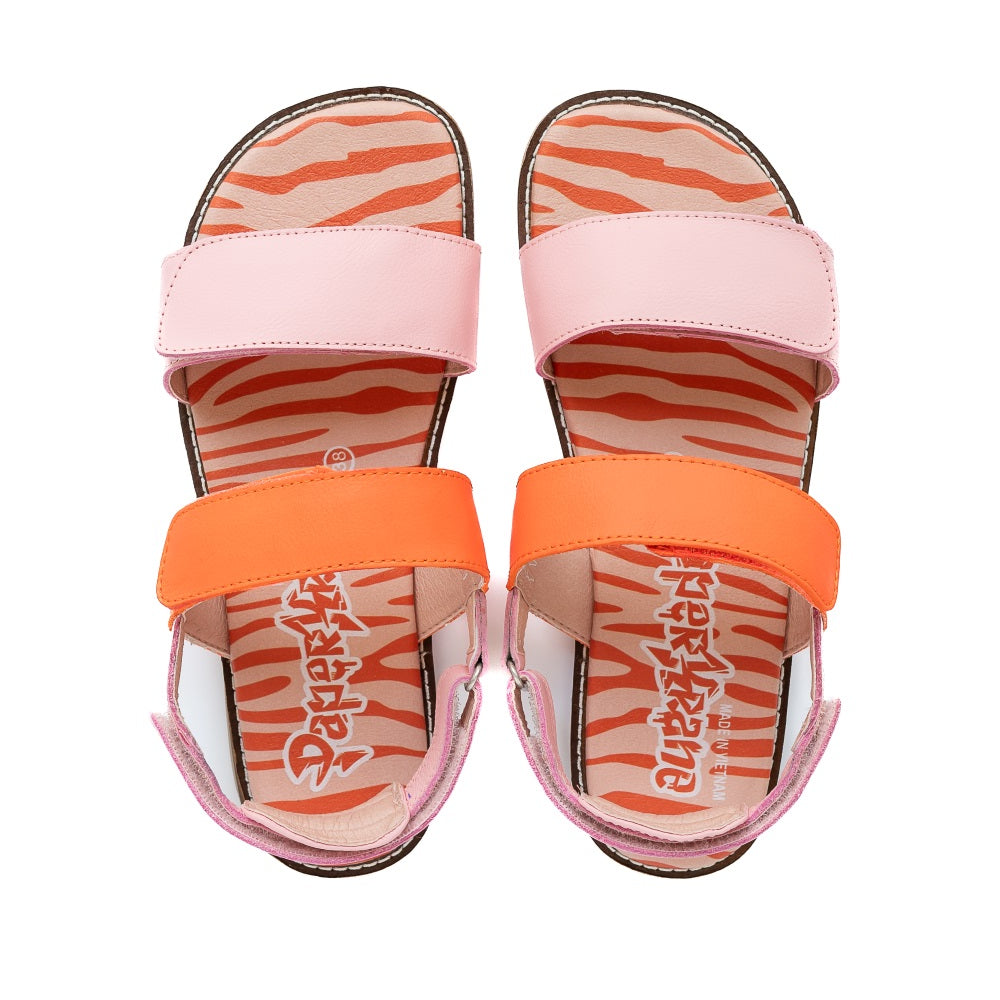 Orange and Pink So Wild PaperKrane leather sandals. Front strap over the ball of the foot and heel straps are pink and thinner strap over the arch is a reddish orange. Sole is an orange and red zebra print. Both shoes are shown from above against a white background. #color_orange-pink