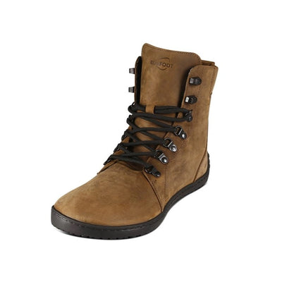 Light Brown shearling-lined leather Realfoot Farmer Winter boots with black laces, eyelets, and soles. Boots go over the ankle with padding and a pull tab in the back and a longer tongue. Two quick lace hooks are at the top of the laces and soles are stitched and glued. Right shoe is shown facing diagonally left against a white background. #color_light-brown