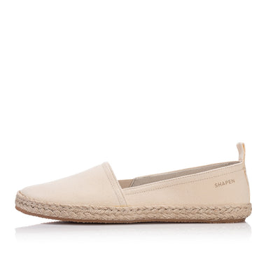 Beige canvas Shapen Espadrilles loafers with a pull tab and tan soles. Left shoe is shown facing left against a white background. #color_beige