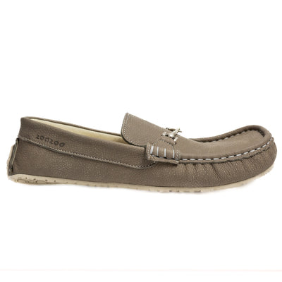 A photo of the Zeazoo Cheetah loafers made from a natural nappa leather upper on a tan Vibram sole. The loafers are stone in color and have a silver metal detail across the top of the foot. The right loafer is shown from the right side on a white background. #color_stone