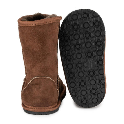 A photo of brown kids Zeezoo dingo boots made with sheepskin and rubber soles. Boots rise to about just under the calf. Left boots is shown from behind with the right boot sole shown against a white background. #color_brown