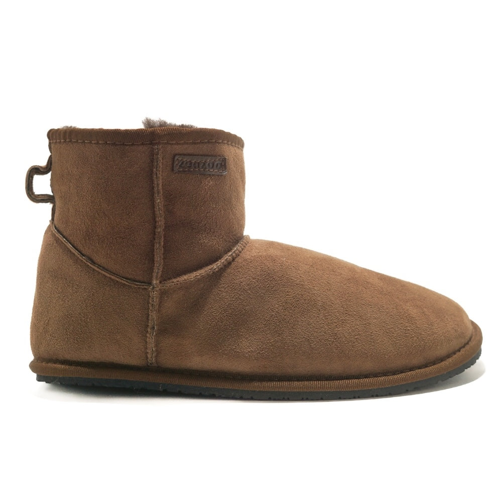 A plain brown Zeazoo Dingo Mini sheepskin ankle boot with a back pull tab, brown wool lining, and black rubber vibram soles. Right shoe is facing right against a white background. #color_brown