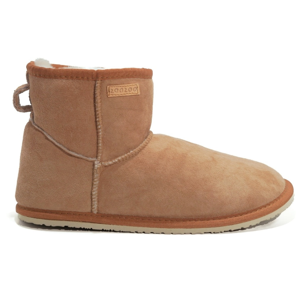 A plain light-brown Zeazoo Dingo Mini sheepskin ankle boot with a back pull tab, cream wool lining, and cream rubber vibram soles. Right shoe is facing right against a white background. #color_chestnut