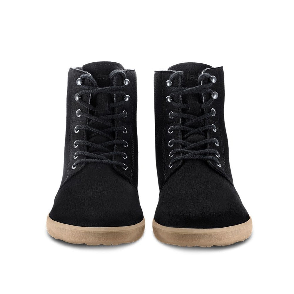 A photo of Be Lenka Winter Neo boots made with leather and rubber soles. The boots are black in color and a lace up style with wool inside. Both boots are shown beside each other from the front against a white background. #color_matte-black-nubuck