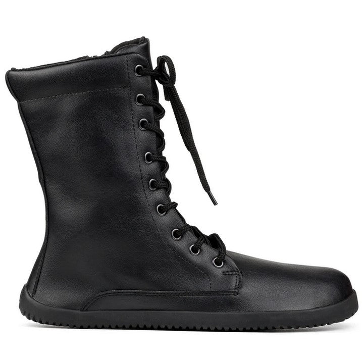 A photo of Ahinsa Jaya boots made from faux leather and rubber soles. The boots are black in color the fit is mid calf and they have laces all the way up. One boot is shown from the right side against a white background. #color_black