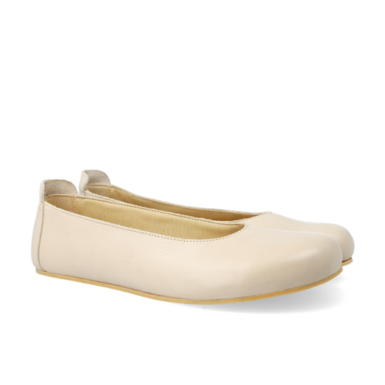 A beige barefoot ballet flat shown diagonally from the right front side of the both shoes on a white background #color_beige