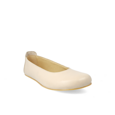 A beige barefoot ballet flat shown diagonally from the right side of the right shoe on a white background #color_beige