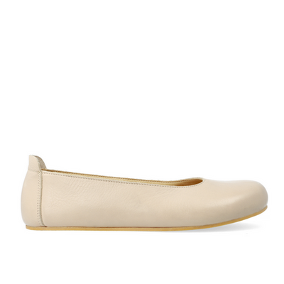 A beige barefoot ballet flat shown from the right side of the right shoe on a white background #color_beige