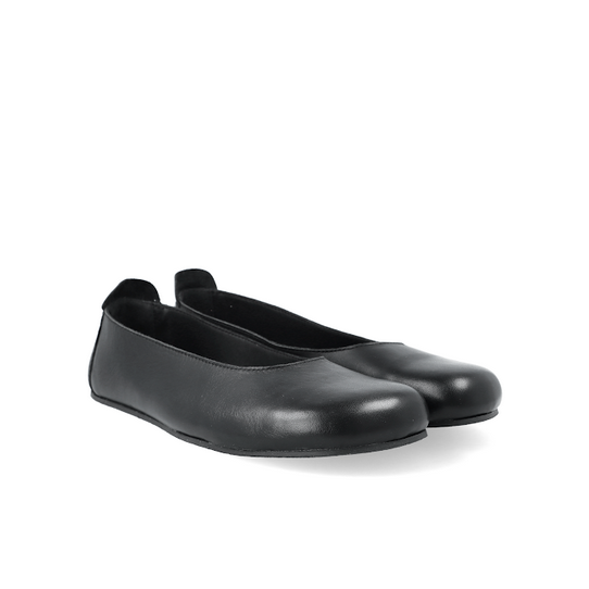 A black barefoot ballet flat shown diagonally from the right front side of the both shoes on a white background #color_black