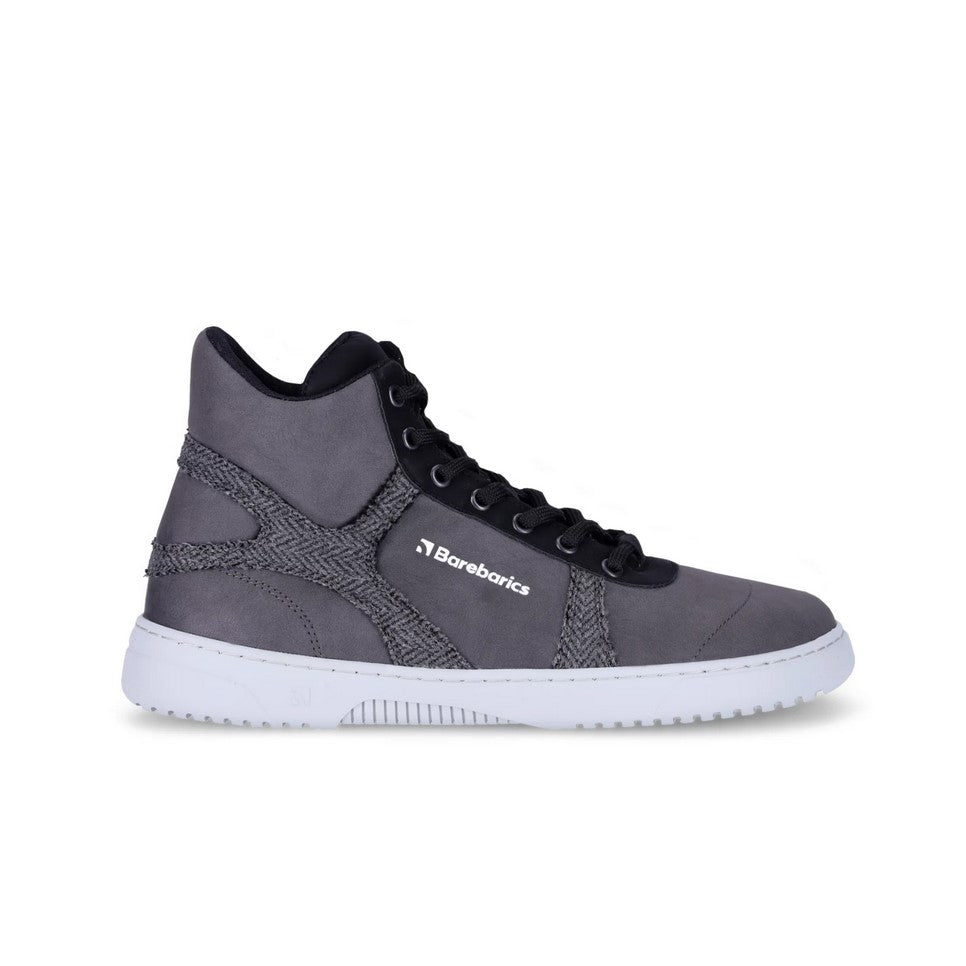a grey high top sneaker with a white sole and black shoelaces shown from the right side on a white background #color_grey