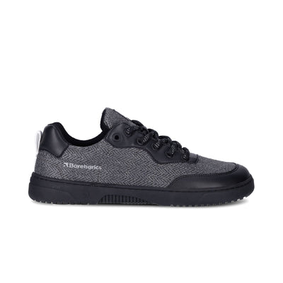 a black and grey sneaker shown from the right side on a white background #color_black-grey