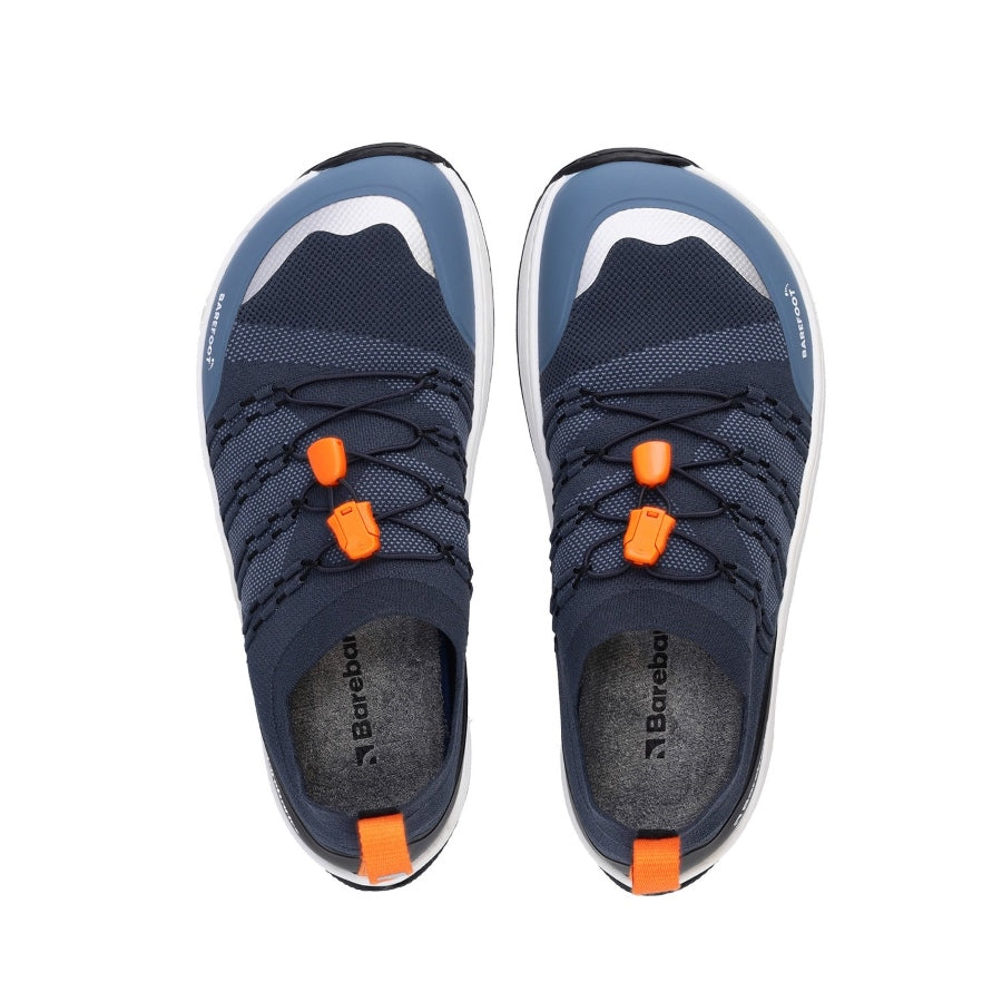 Photo 1 - A photo of Barebarics Voyager active sneakers. The sneakers are made with a dark blue sock-like stretch fabric with black protector fabric around the front and back of the shoe. Interwoven black strings on either side hold the black elastic quick laces in place. Right sneaker is shown here from the right side against a white background., Photo 2 - Both shoes are shown from the top down against a white background. #color_dark-blue-white