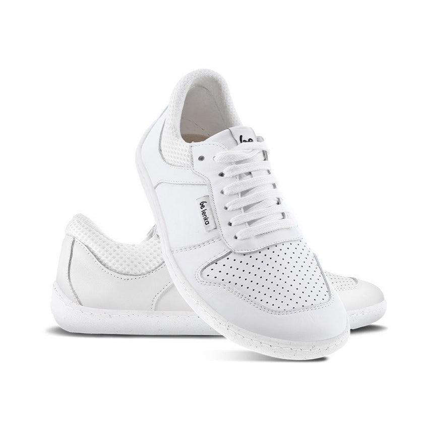 A photo of White Be Lenka Champ 2.0 Retro Sneaker with white soles. Left shoe is shown from the right with the right shoe propped up on the left to show the top of the shoe. Background is white. #color_white