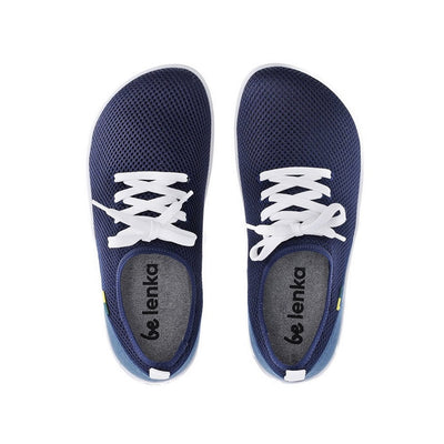 Photo 1 - Be Lenka Dash mesh sneakers in dark blue. Sneakers feature a dark blue mesh fabric with white laces, white soles, and a dark blue overlaying soft fabric cupping the bottom of the heel. The mesh fabric surrounds the entire shoe and laces are woven within the fabric. Shoe is shown from the right side with a white background., Photo 2 - Be Lenka Dash mesh sneakers in dark blue. Both shoes are shown from the top down against a white background. #color_dark-blue