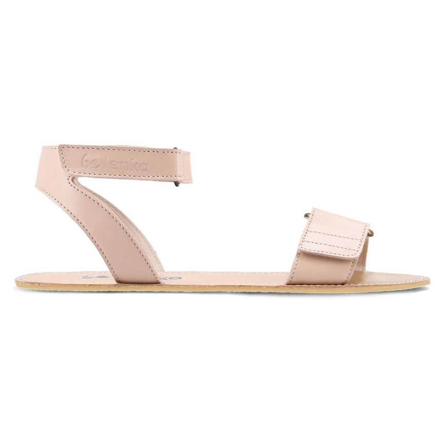 A photo of beige leather Be Lenka Iris Sandals. An adjustable strap wraps around the ankle once with an open heel while a thicker adjustable strap goes over the toes. Right sandal is shown from the right side against a white background. #color_nude