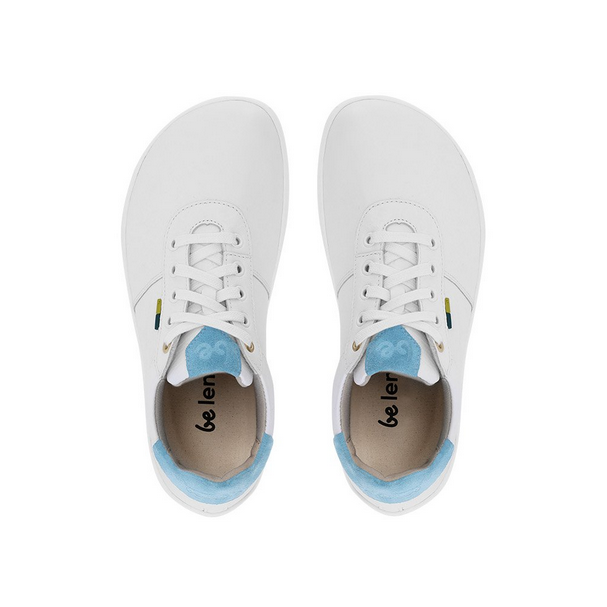 A photo of Be Lenka Royale sneakers made with a leather upper and a rubber sole. The sneakers are a white color and the area around the heel is light blue, they have small yellow and blue tag on the side. Both sneakers are shown facing upright beside each other from the top down against a white background. #color_white-blue