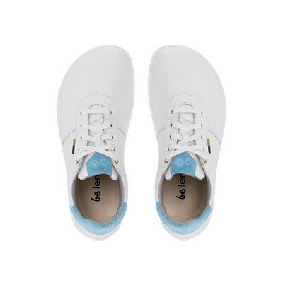 A photo of Be Lenka Royale sneakers made with a leather upper and a rubber sole. The sneakers are a white color and the area around the heel is light blue, they have small yellow and blue tag on the side. Both sneakers are shown facing upright beside each other from the top down against a white background. #color_white-blue