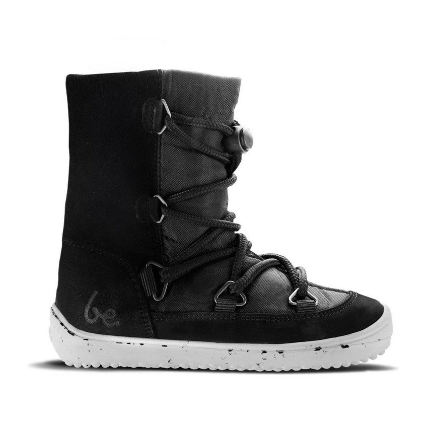 A photo of Be Lenka Kids Snowfox boots in black. Black suede and textile and light grey soles surround the outside. Black laces are widely connected from side to side starting at the ball of the foot and going until the top of the boot with a quick lace connector securing the laces in place. Shoe is shown from the right side against a white background. #color_black