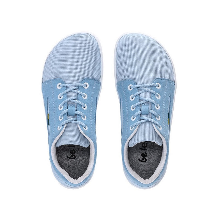 Photo 1 - Be Lenka Whiz mesh sneakers in light blue. Sneakers feature a grey mesh fabric with an overlaying soft fabric around the top of the heel, on the bottom sides, and surrounding the lace eyelets. A triangle cut out shows the mesh fabric under the soft fabric on the sides of the sneaker. Shoe is shown from the right side with a white background., Photo 2 - Be Lenka Whiz mesh sneakers in light blue. Both shoes are shown from the top down against a white background. #color_light-blue