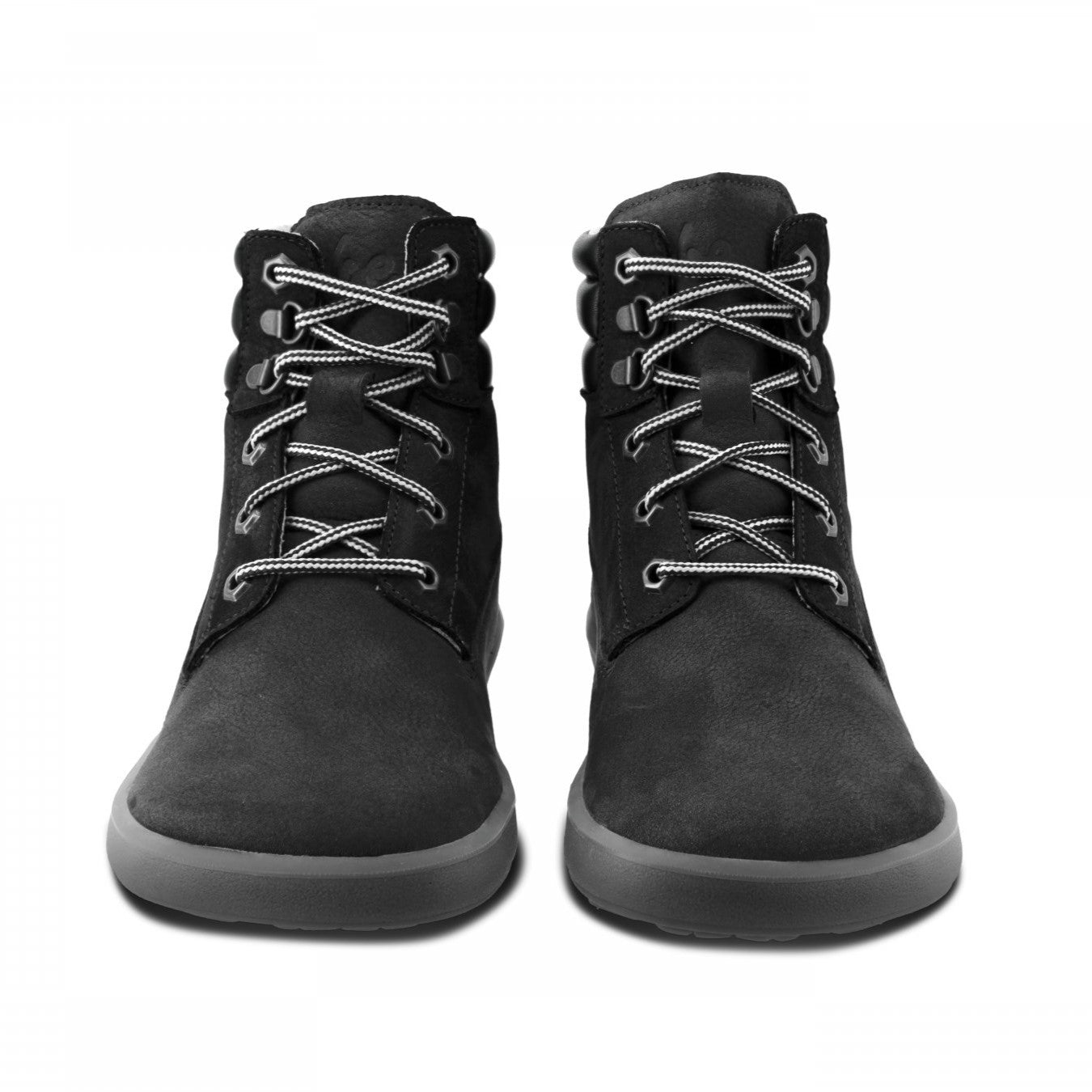 A photo of Be Lenka Nevada Boots made from nubuck leather and rubber soles. The boots are black in color, they are combat boot style with laces a padded color and a chunky eyelets. Both boots are shown beside each other from the front against a white background. #color_black