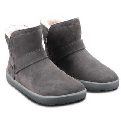 A photo of Belenka Polaris made from nubuck leather, sheepskin, and rubber soles. The boots are grey in color they are a slip on with sheepskin inside. Both boots are shown from the right angled slightly to the front against white background. #color_grey