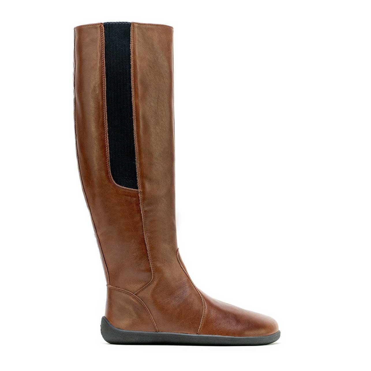 A photo of Belenka Sierra made from smooth leather, fleece, and rubber soles. The boots are brown in color with a tall riding boot elastic paneled shaft lined with fleece. One boot is shown from the right side against a white background. #color_dark-brown