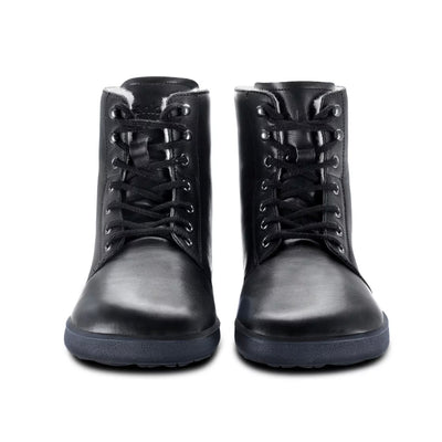 A photo of Be Lenka Winter Neo boots made with leather and rubber soles. The boots are black in color and a lace up style with wool inside. Both boots are shown beside each other from the front against a white background. #color_black-smooth-leather