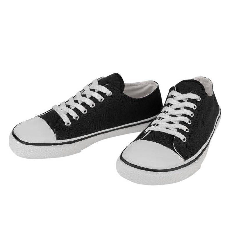 A photo of Bohempia Herlik canvas sneakers made from canvas and rubber soles. The sneakers are a black color with a white toe cap and a black outline around the white rubber soles. Both sneakers are shown together from the front left on a white background. #color_black-white