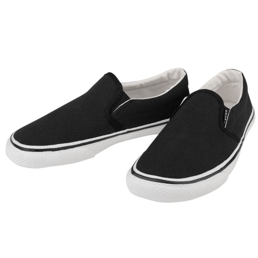 A photo of Bohempia Velik slip on sneakers made from canvas and rubber soles. The sneakers are a black color and white soles with a black stripe around the sole. Both shoes are shown beside each other facing toward the left against a white background. #color_black-white