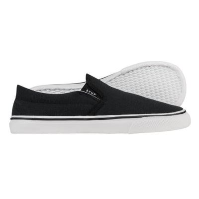 A photo of Bohempia Velik slip on sneakers made from canvas and rubber soles. The sneakers are a black color and white soles with a black stripe around the sole. Both shoes are shown beside each other the right shoe is in front facing towards the right and the left shoe is shown behind the right shoe laying on it’s side with the sole towards the front against a white background. #color_black-white